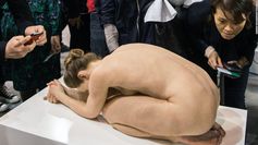 What kind of model could pose nude in a gallery 24-hours-a-day? Answer: The fake kind. Welcome to Art Basel, one of Asia's (if not the world's) biggest art fairs, which opened this week with the eerily lifelike sculpture of a naked woman by Australian artist Sam Jinks.
